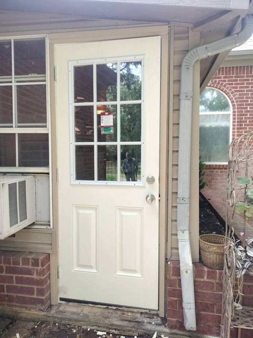 New nine-lite exterior door with fresh trim